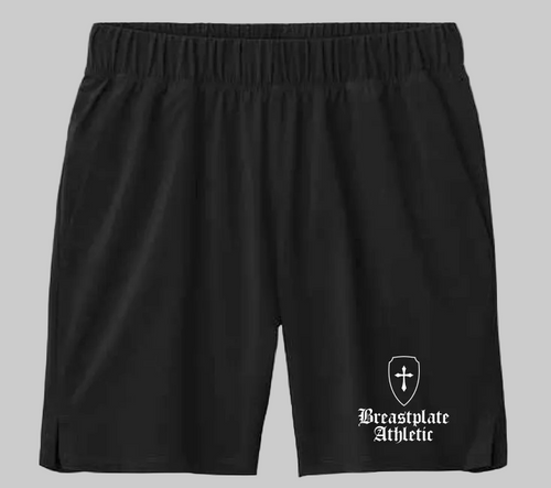 Black athletic shorts with a logo and text on a white background